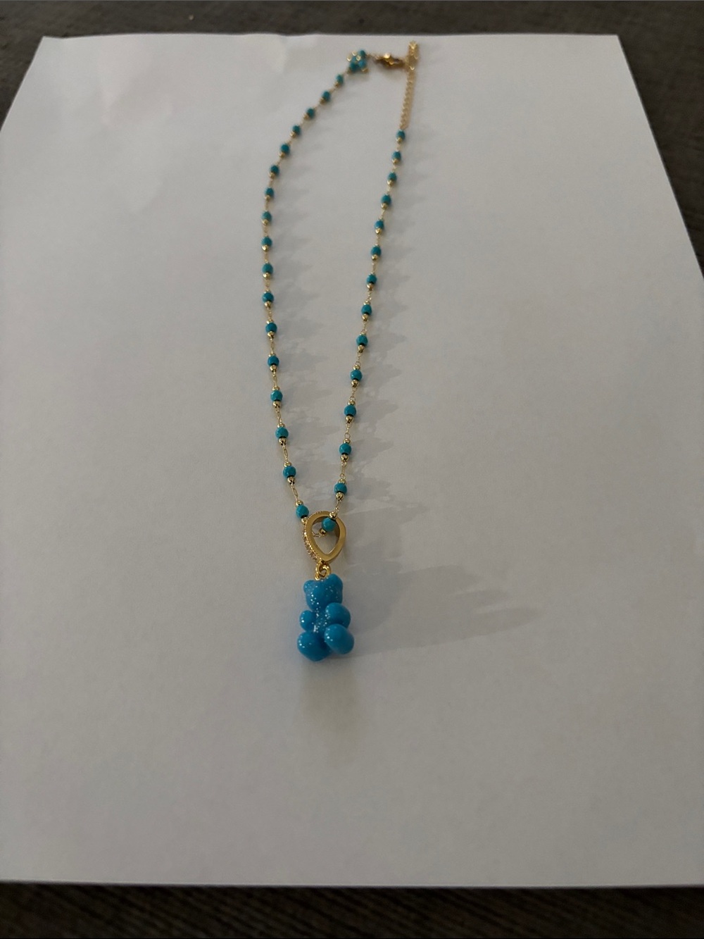 Gold-Tone Necklace with Blue Beaded Gummy Charm